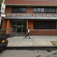 A man walks past the New York City Department of Health and Mental Hygiene in the Jamaica section of Queens, NY, August 2, 2022. New York City has declared a State of Emergency over Monkeypox as more than 1500 cases have been reported in the city.
